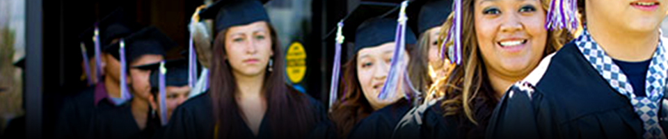 Students smiling walking to graduation ceremony