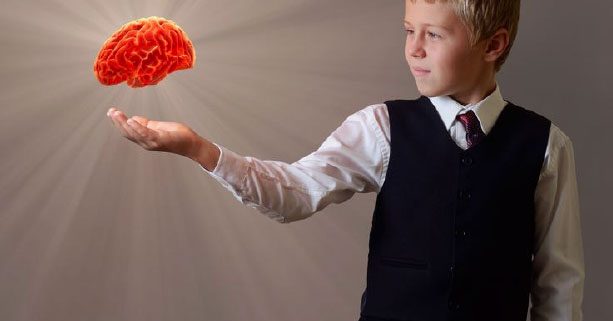 Boy with floating brain in hand