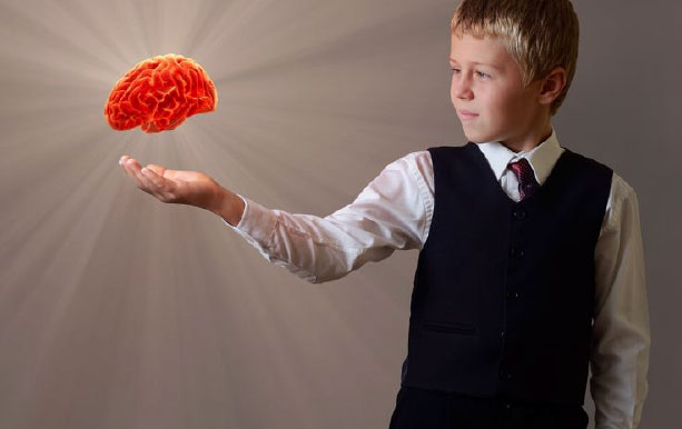 Boy with floating brain in hand