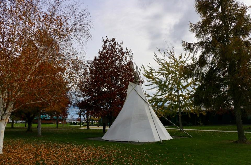 Fall shot of campus with tipi