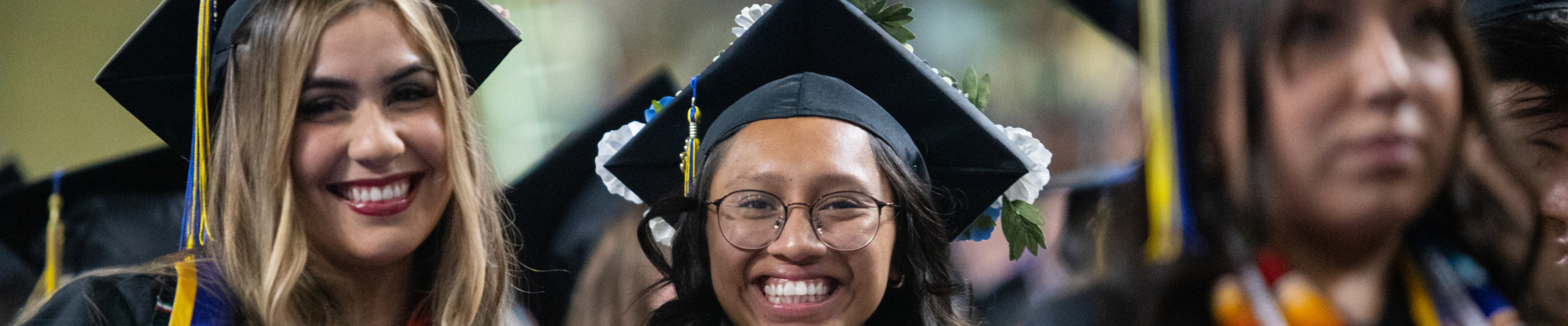 Graduates looking happy during Heritage University commencement